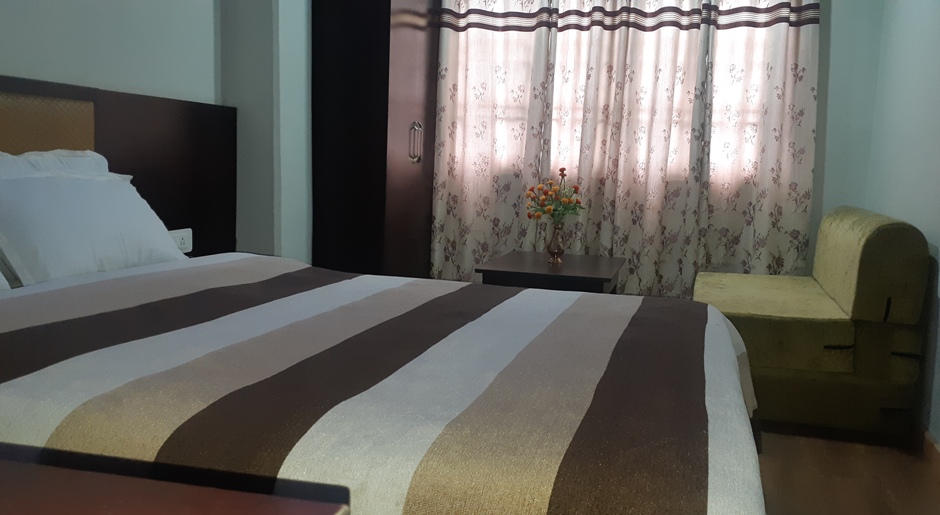 Deluxe Four Bed Room, THE HOTEL KASTURI GANGTOK - Budget Hotels in Gangtok